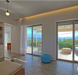 5 bedroom luxury villa with infinity pool, sea views and tennis court near Chania, sleeps 10